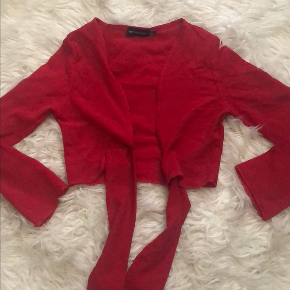 Red tie around long sleeve never worn